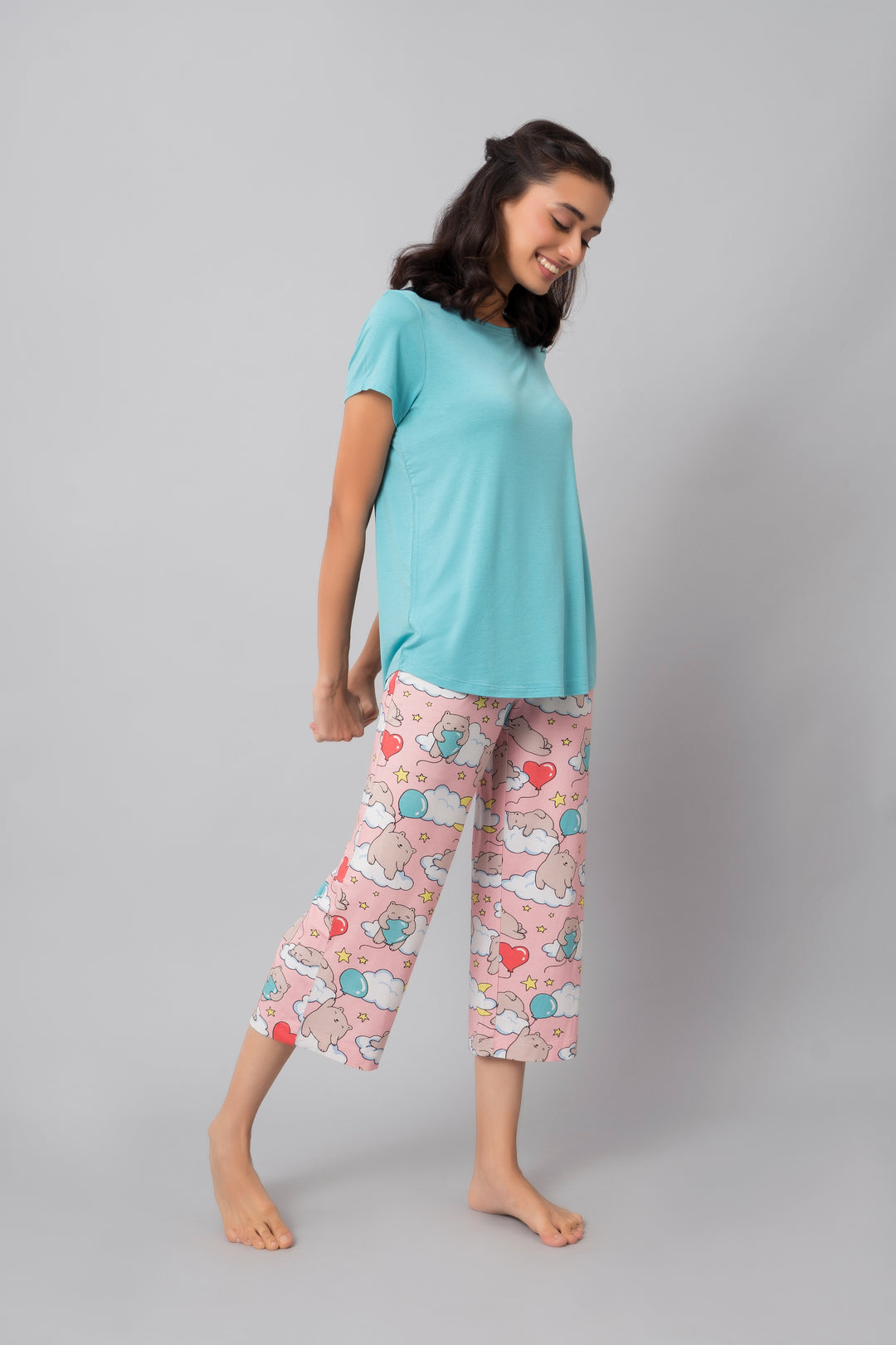 Dreamy Day Capri Set featuring a light blue top and colorful printed pants.