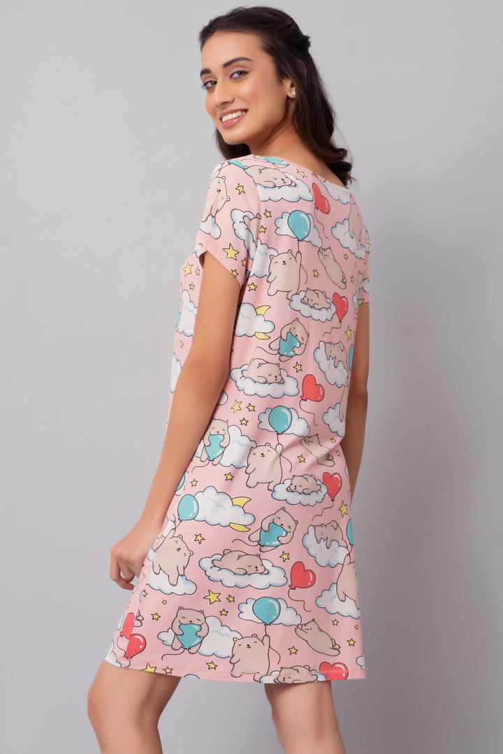 Playful pink short dress with adorable cloud and bear print.