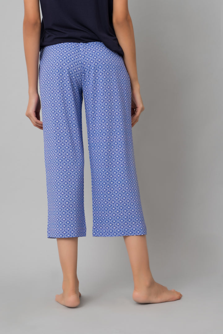 Floral Mosaic Capri Set featuring elegant blue patterned pants.