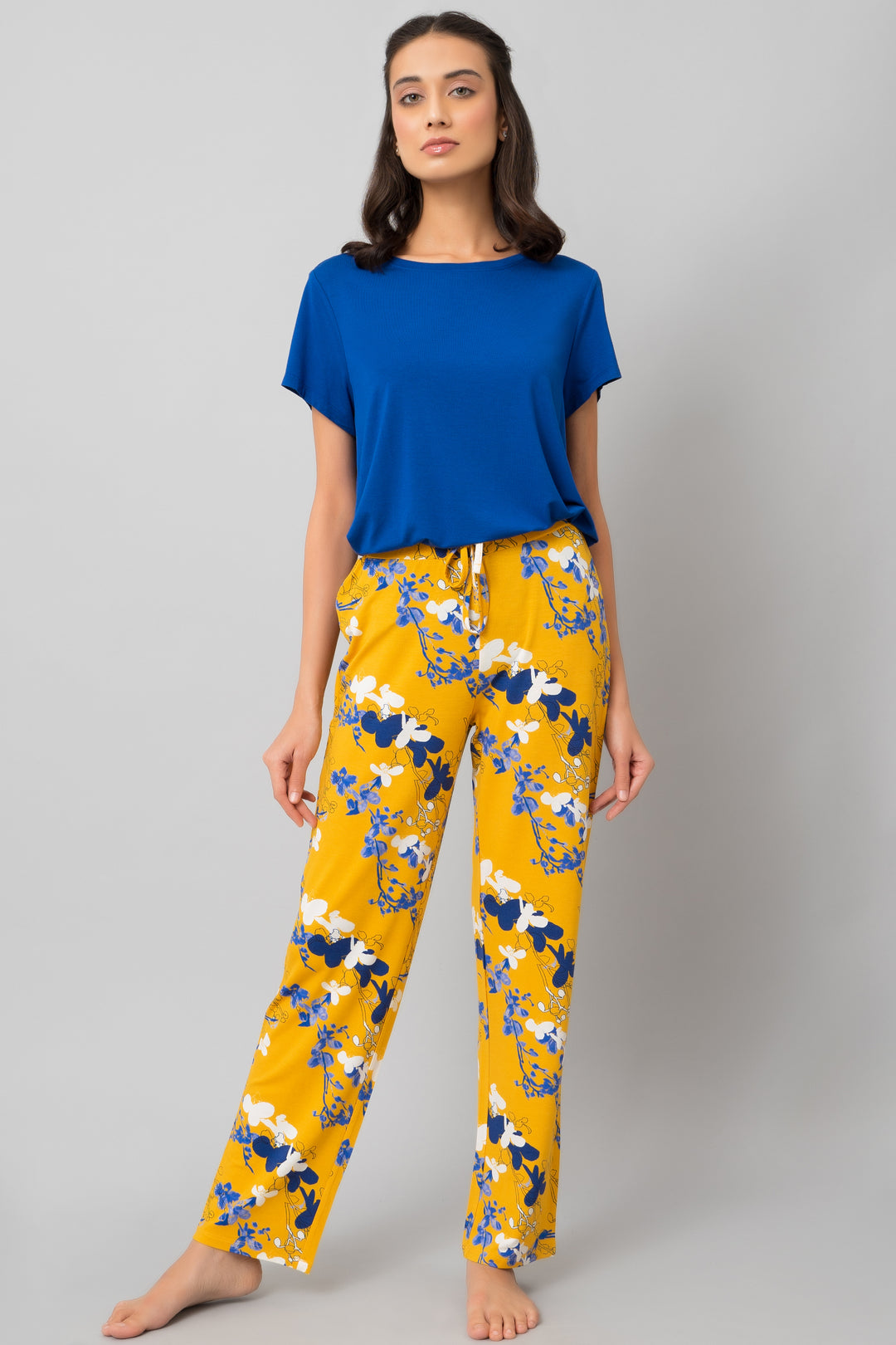 Floral Love Pajama Set featuring vibrant blue top and yellow floral pants.