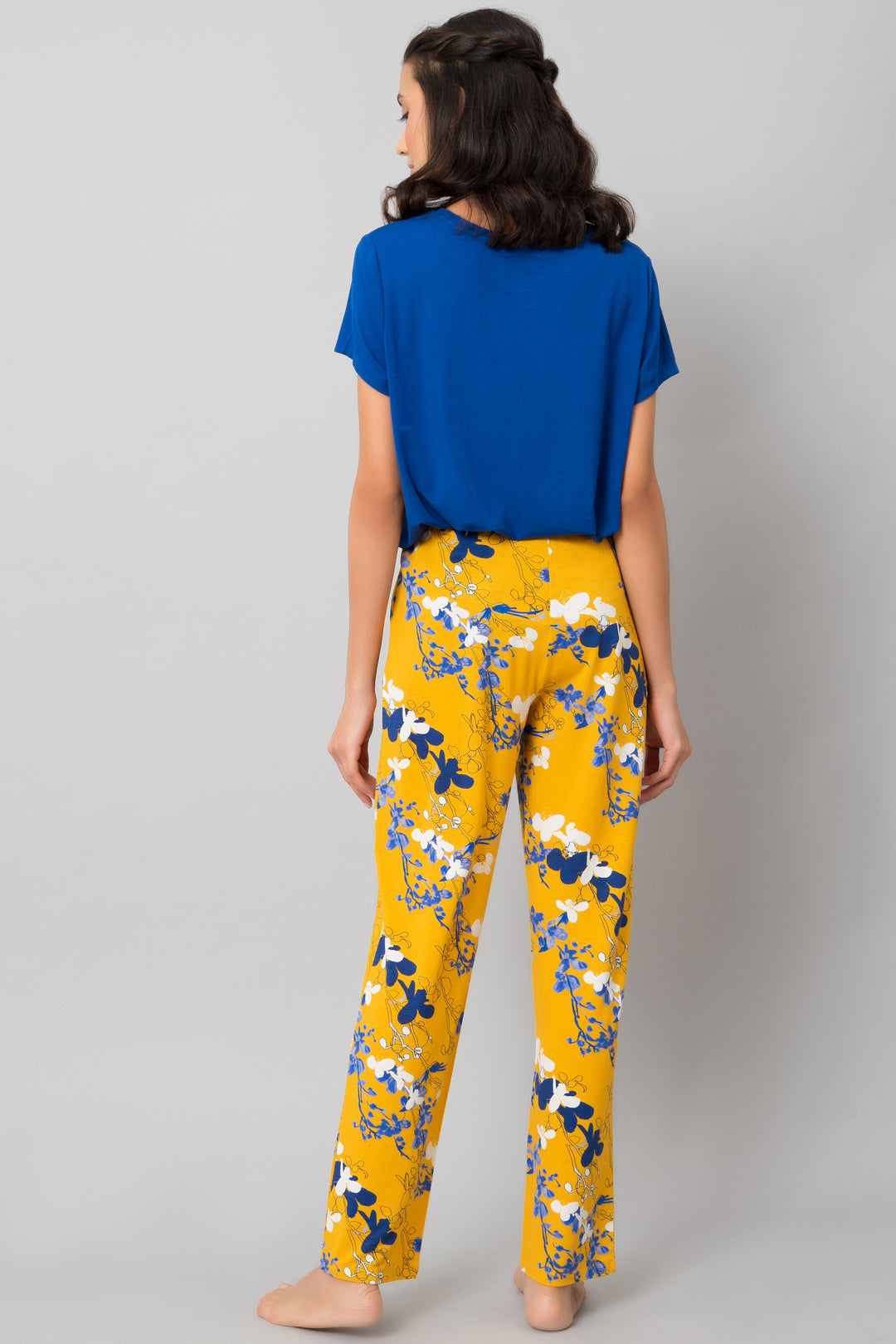 Floral Love Pajama Set featuring a blue top and yellow floral pants.