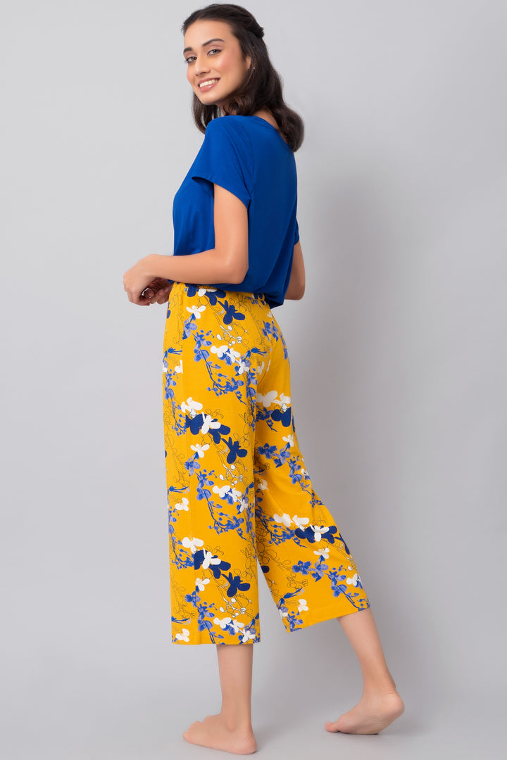 Floral Love Capri Set featuring blue top and floral yellow pants.