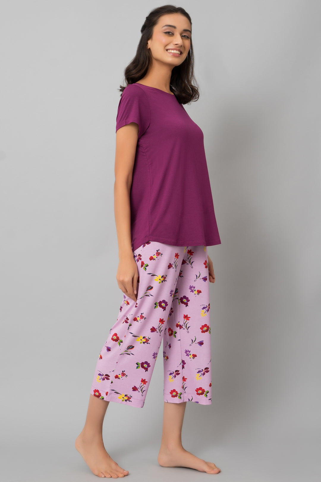 Winter Romance Capri Set: Stylish purple top with floral capri pants.