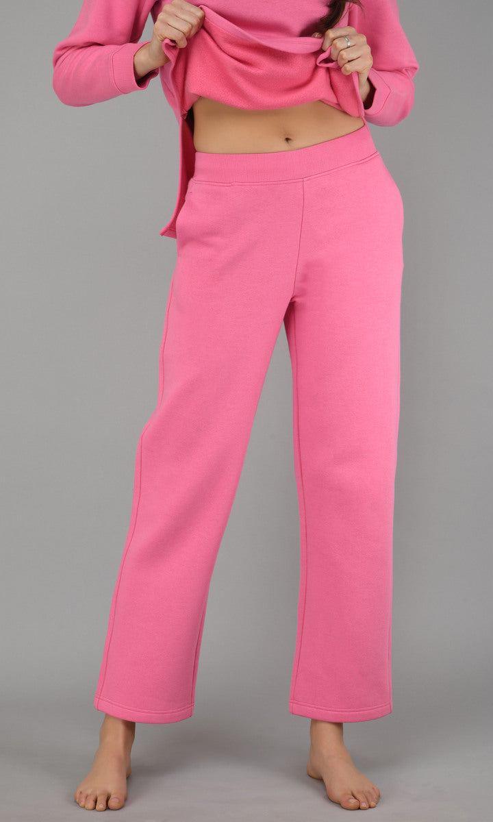 Feisty Pink Fleece Sweatshirt styled with matching pants for a cozy look.