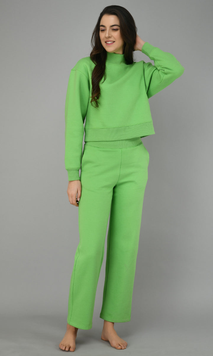 Glam green fleece lounge set with cropped top and matching pants.