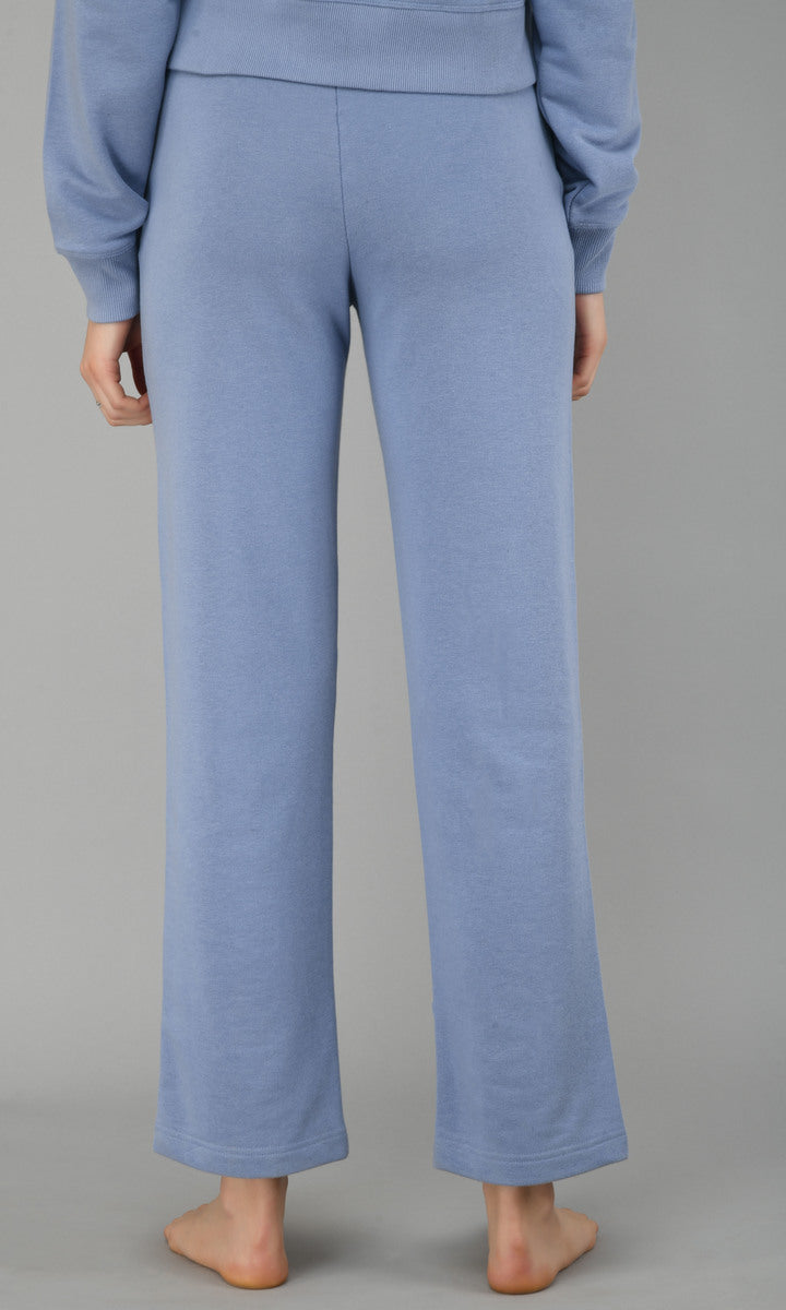 Ice-blue fleece lounge set showcasing comfortable relaxed fit pants.