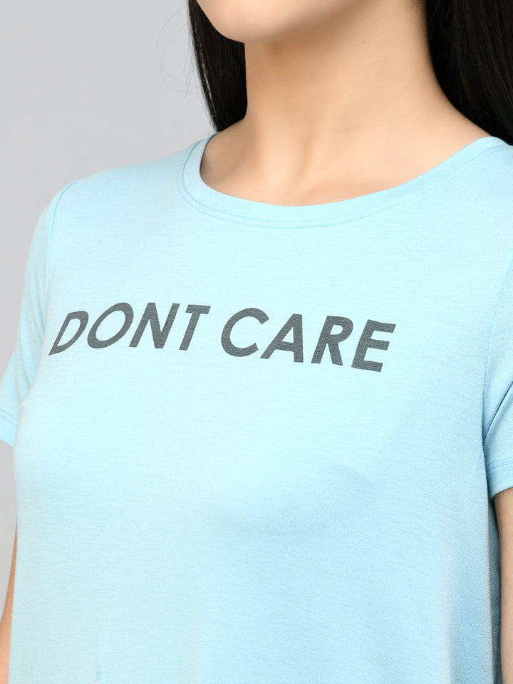 "Blue summer shorts set with ‘Don't Care’ graphic design."