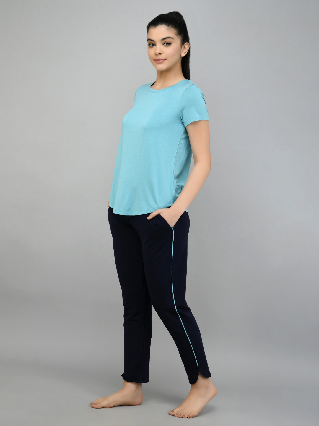 Navy jogger set with teal piping, featuring a casual blue top.