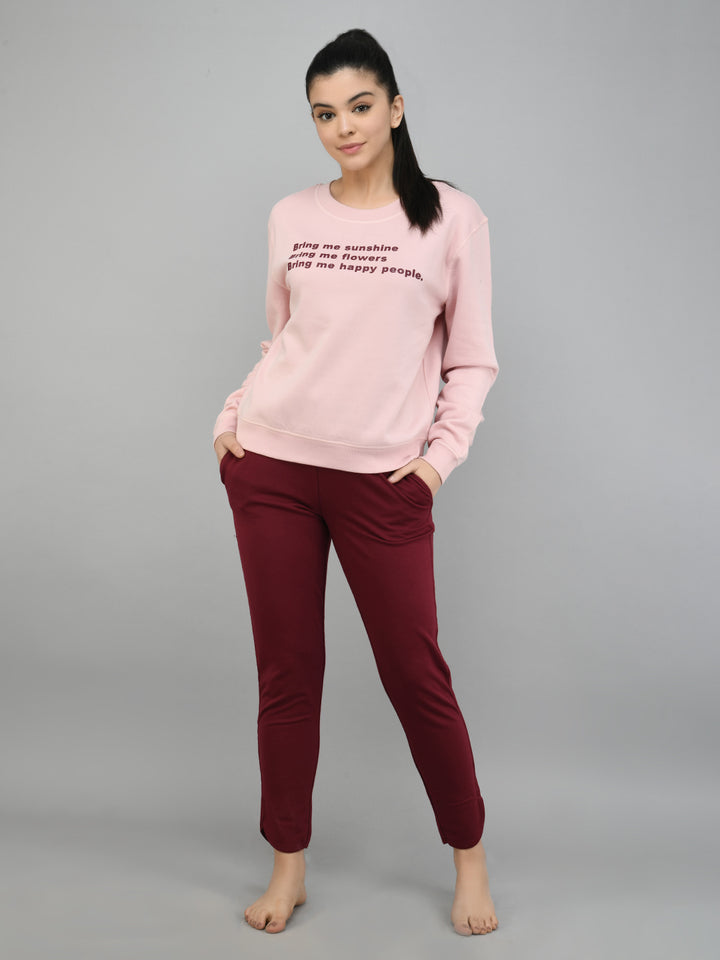 Stylish Ruby Red jogger set featuring a cozy pink sweatshirt.