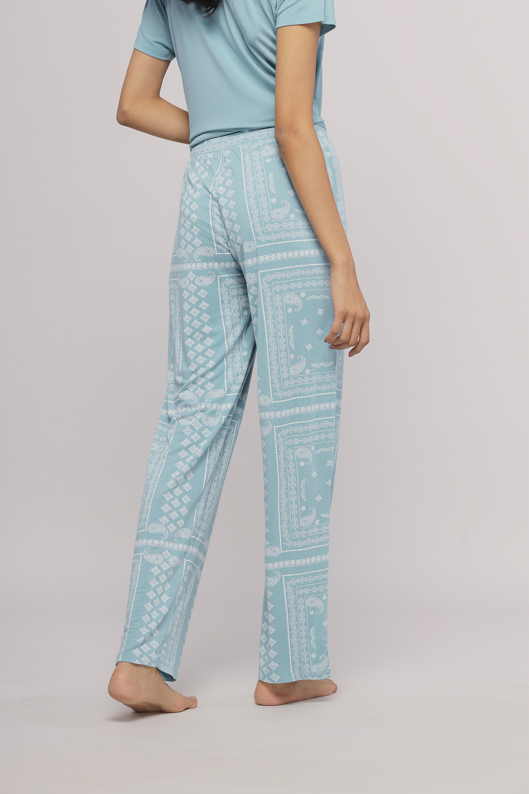 Geometric paisley pajama set featuring light blue patterned pants.