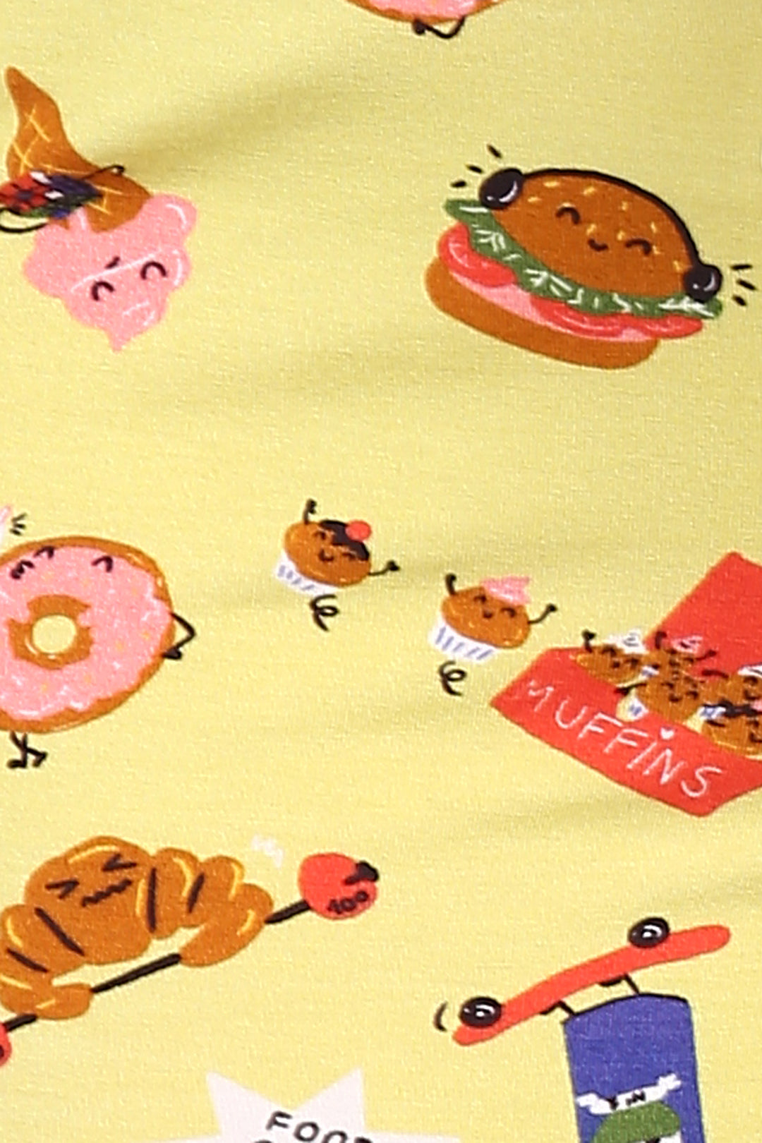 Colorful food-themed prints on a Social Vegan Capri Set.