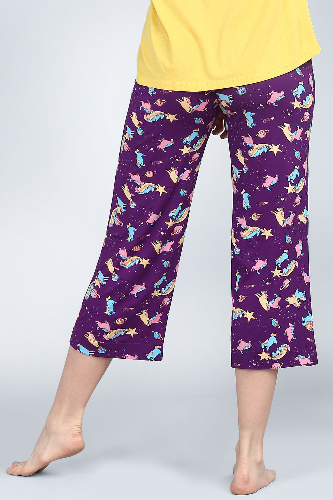 Spaced Out Unicorn Capri with colorful unicorn and star pattern.