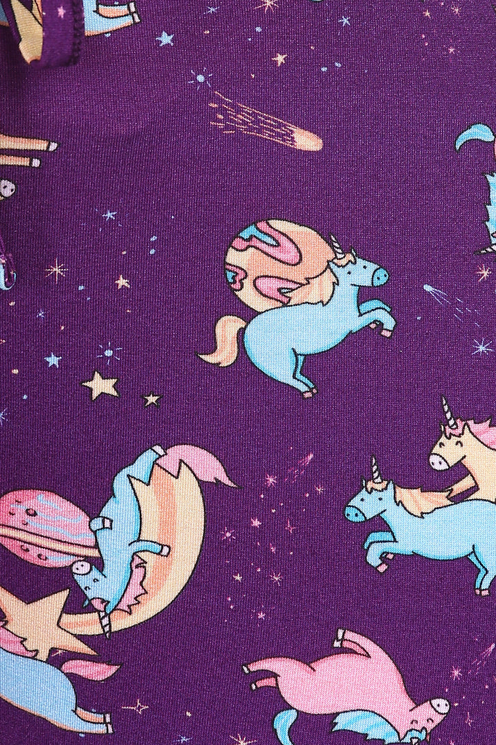 Colorful unicorns and stars on purple fabric for Spaced Out Capri.