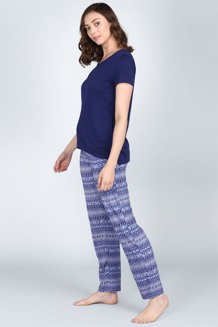 Blue Tiger Pajamas featuring a stylish navy top and patterned pants.