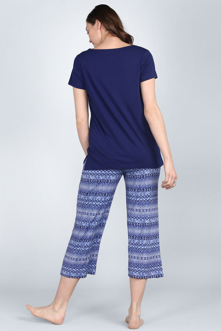 Royal Blue V-Neck Capri Set with patterned pants and short sleeves.