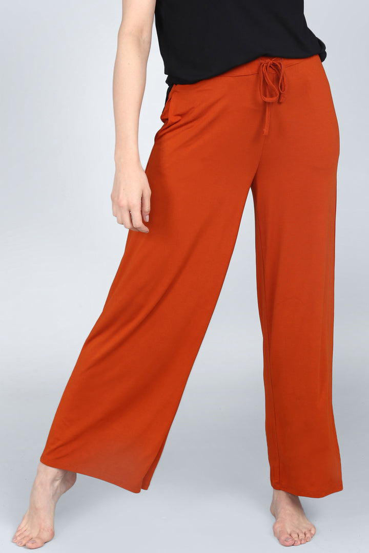 Potter Clay Lounge Pant in vibrant orange, perfect for casual comfort.