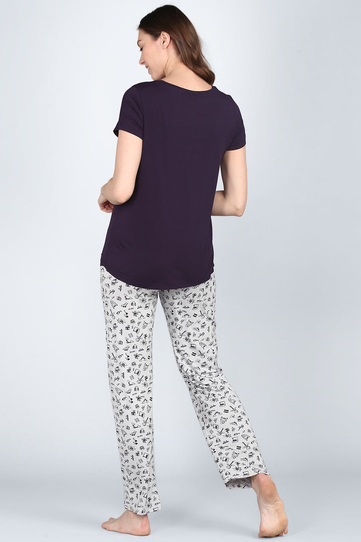 Stylish Bon Voyage Pajamas with comfortable top and graphic print pants.