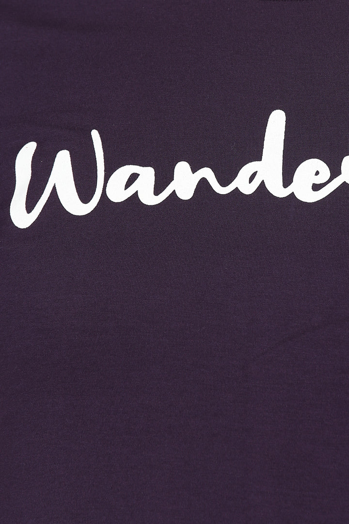 Bon Voyage Pajamas with 'Wander' text design on dark background.