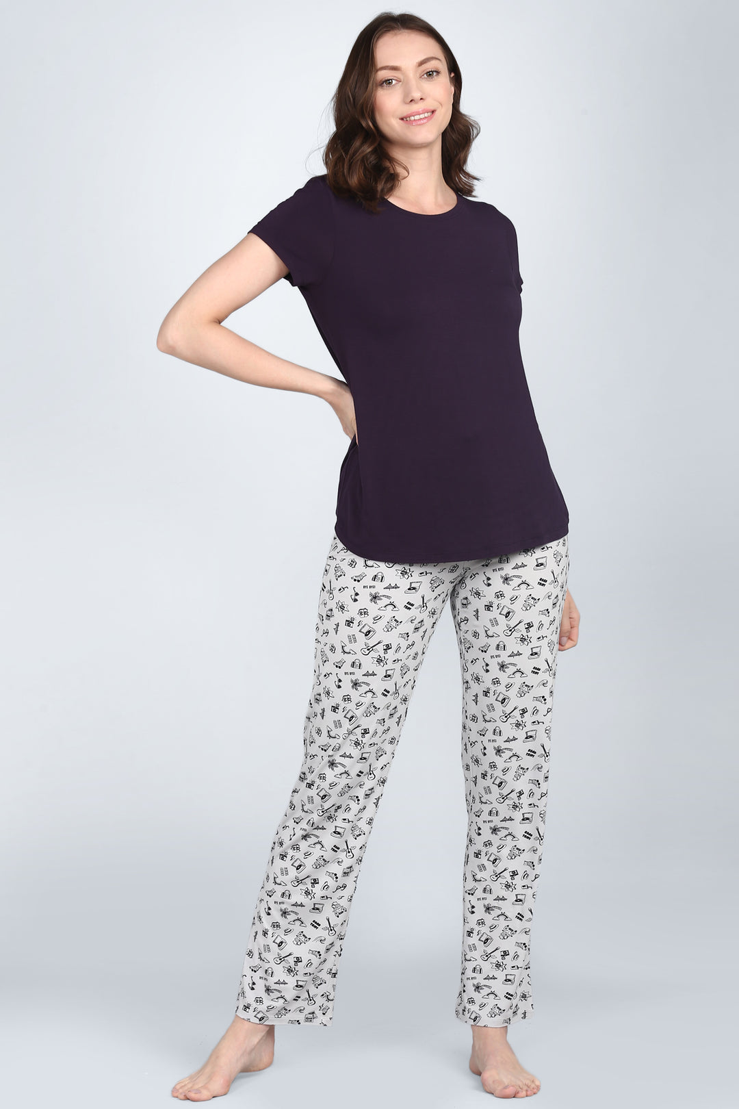 Bon Voyage Pajamas model showcasing comfortable, stylish travel-themed sleepwear.