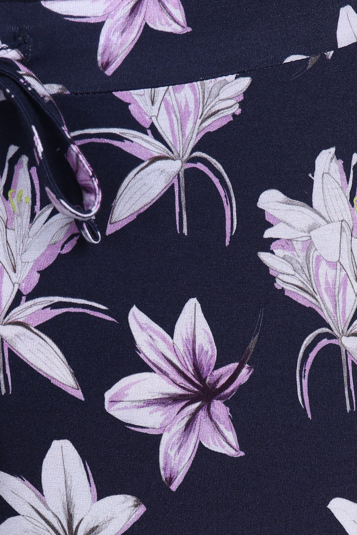 Happy Blossoms Capri Set featuring elegant floral design on navy fabric.