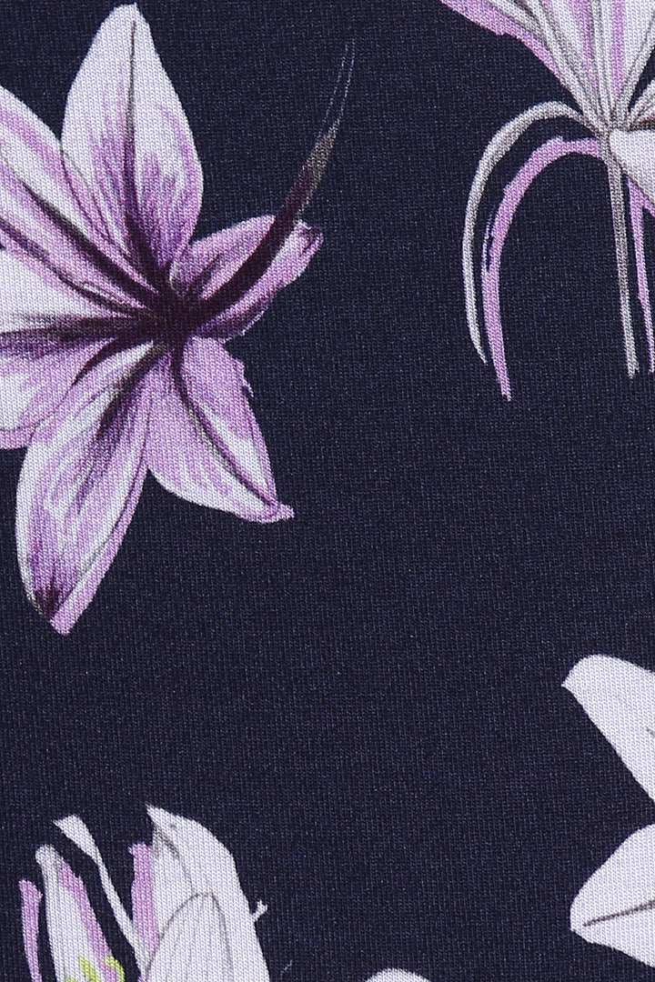 Purple floral pattern on navy fabric for Happy Blossoms Pajamas.