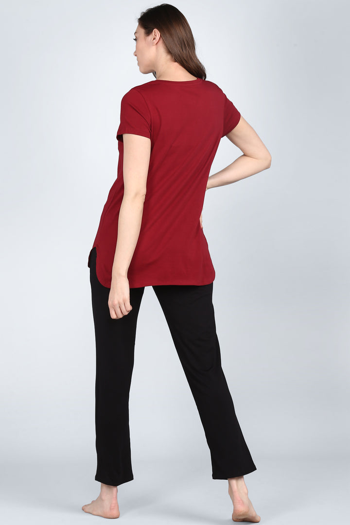 Ruby Red Lounge Set featuring a stylish red top and black pants.