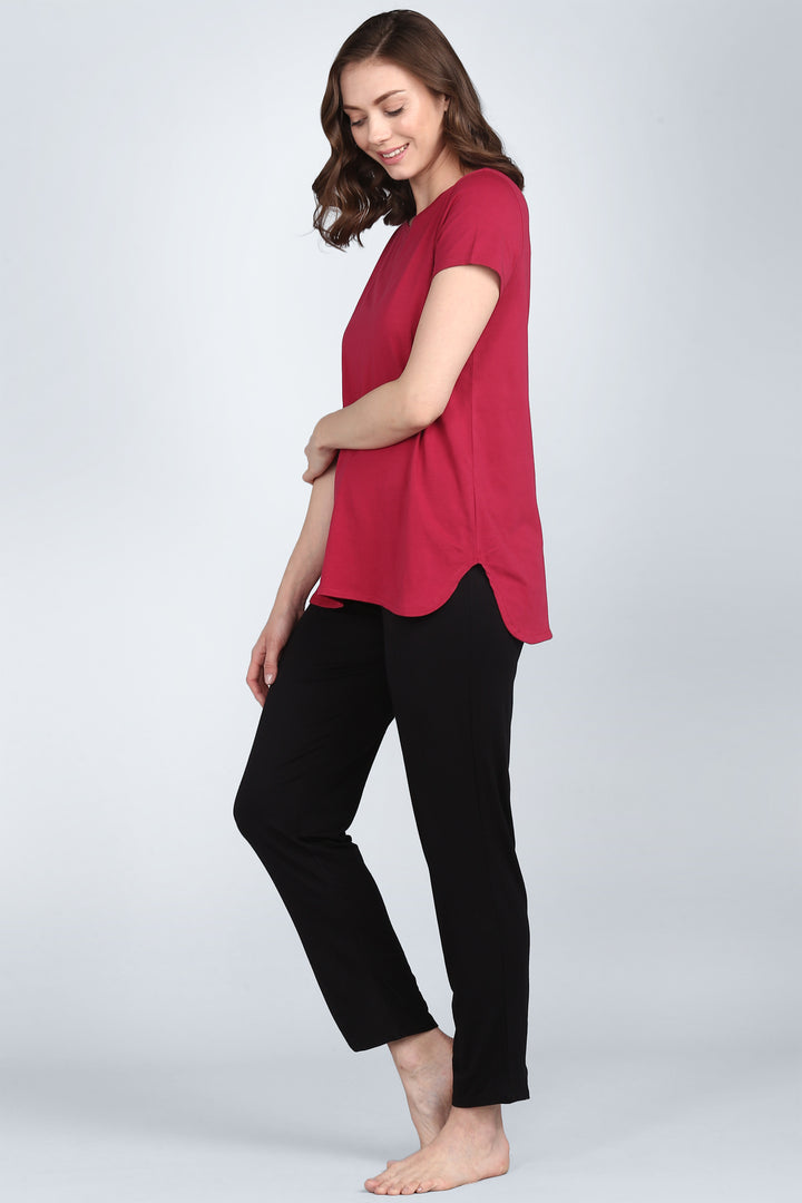 Roseate Lounge Set featuring a stylish red top and black pants.