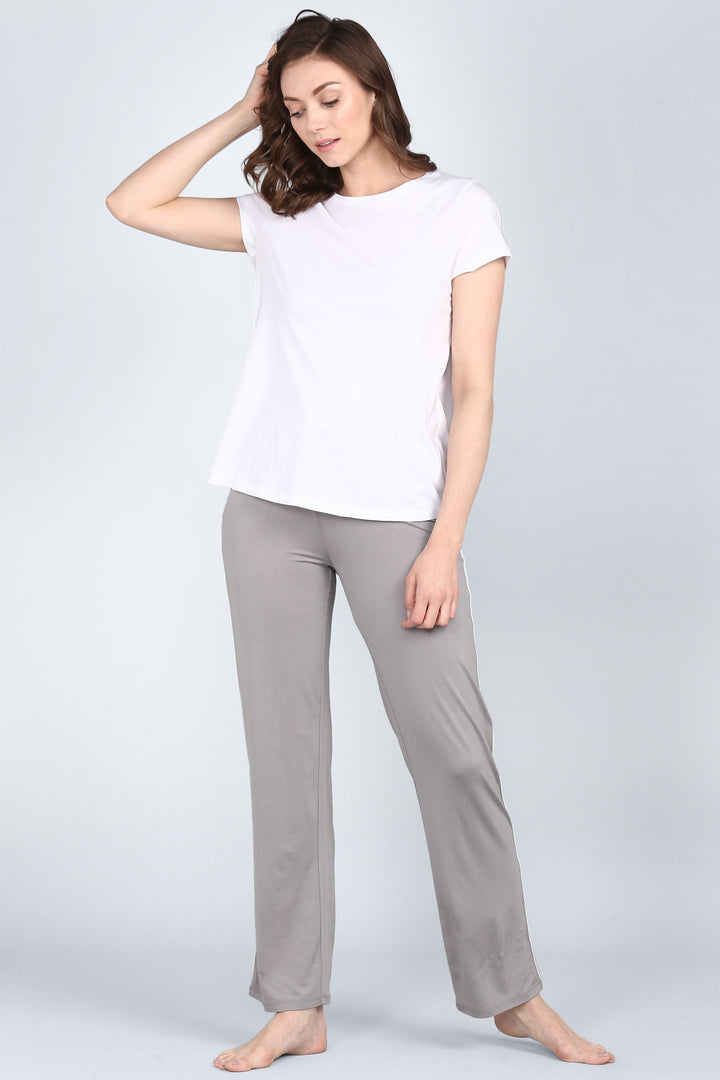 Model wearing comfortable Deep Grey Pajama Set with short-sleeve top.