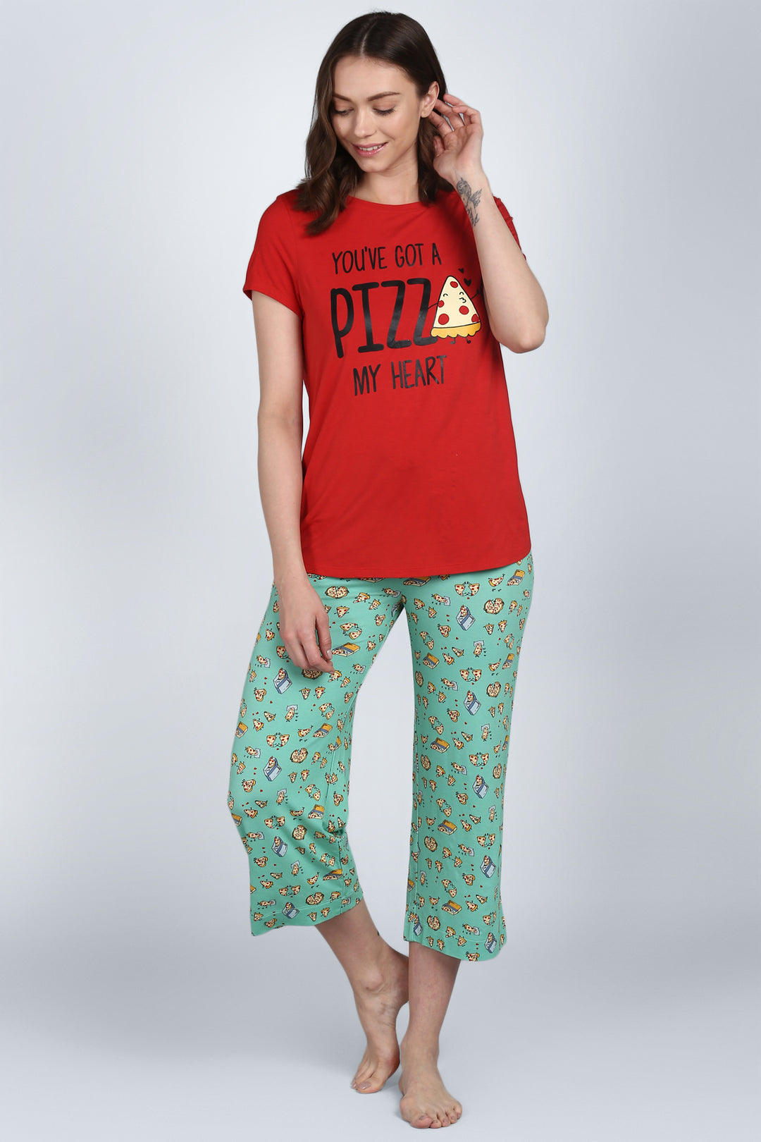 Red pajama set featuring "Pizza My Heart" graphic design.