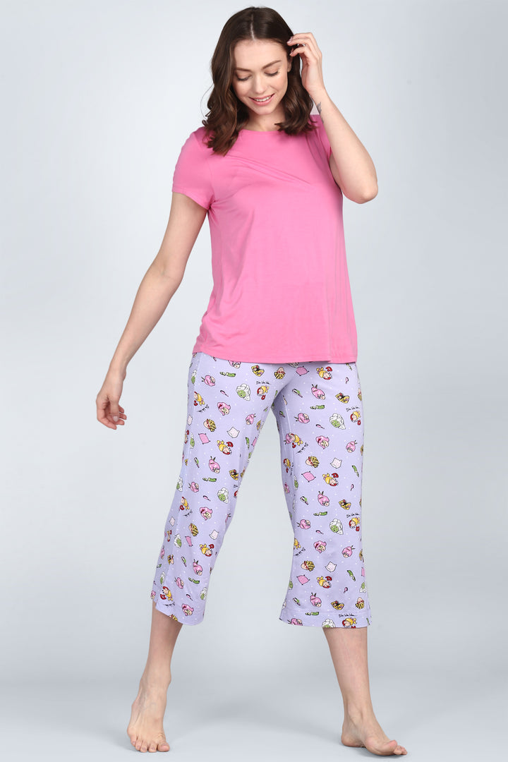 Hearty Pink Capri Set featuring a pink top and patterned lavender pants.