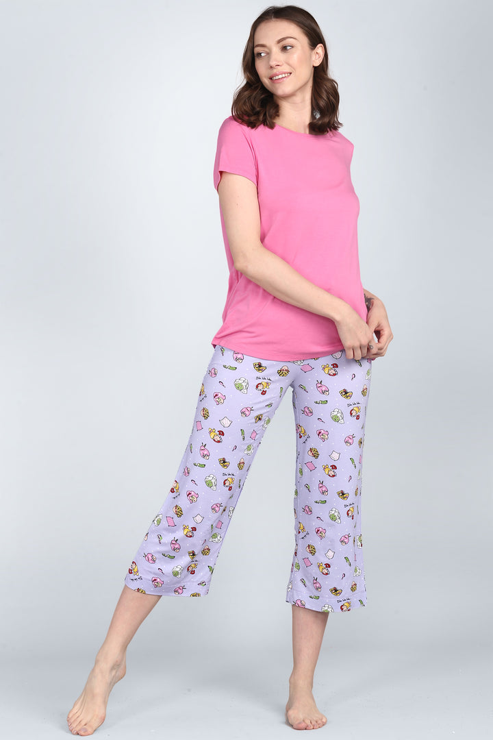 Hearty Pink Capri Set with colorful patterned pants and pink top.