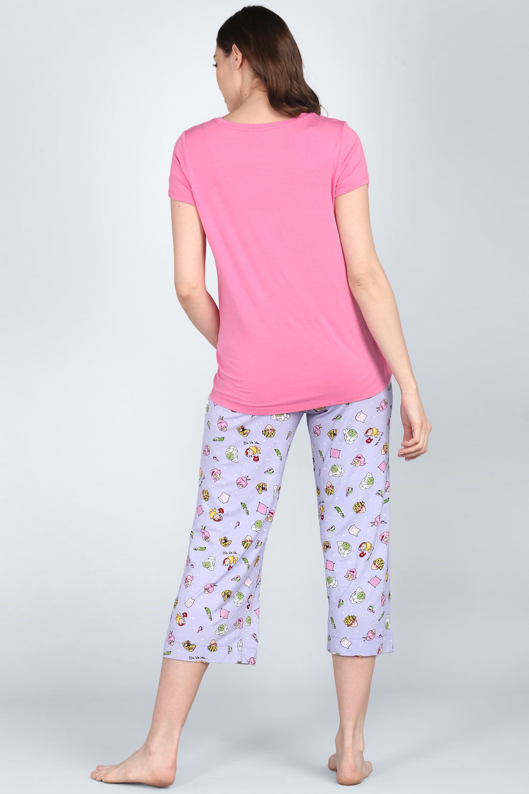 Hearty pink capri set with playful patterned pants, perfect for comfort.