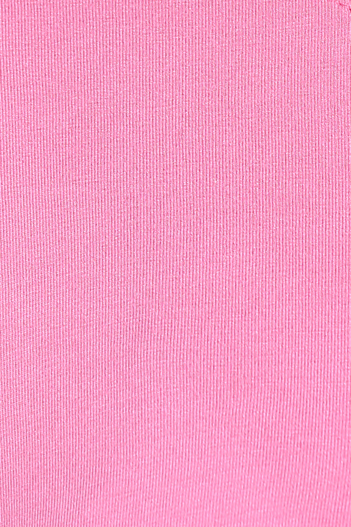 Hearty pink pajama set soft fabric detail close-up.