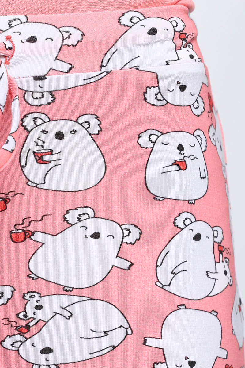 Cute koala print on pink pajamas for coffee lovers.