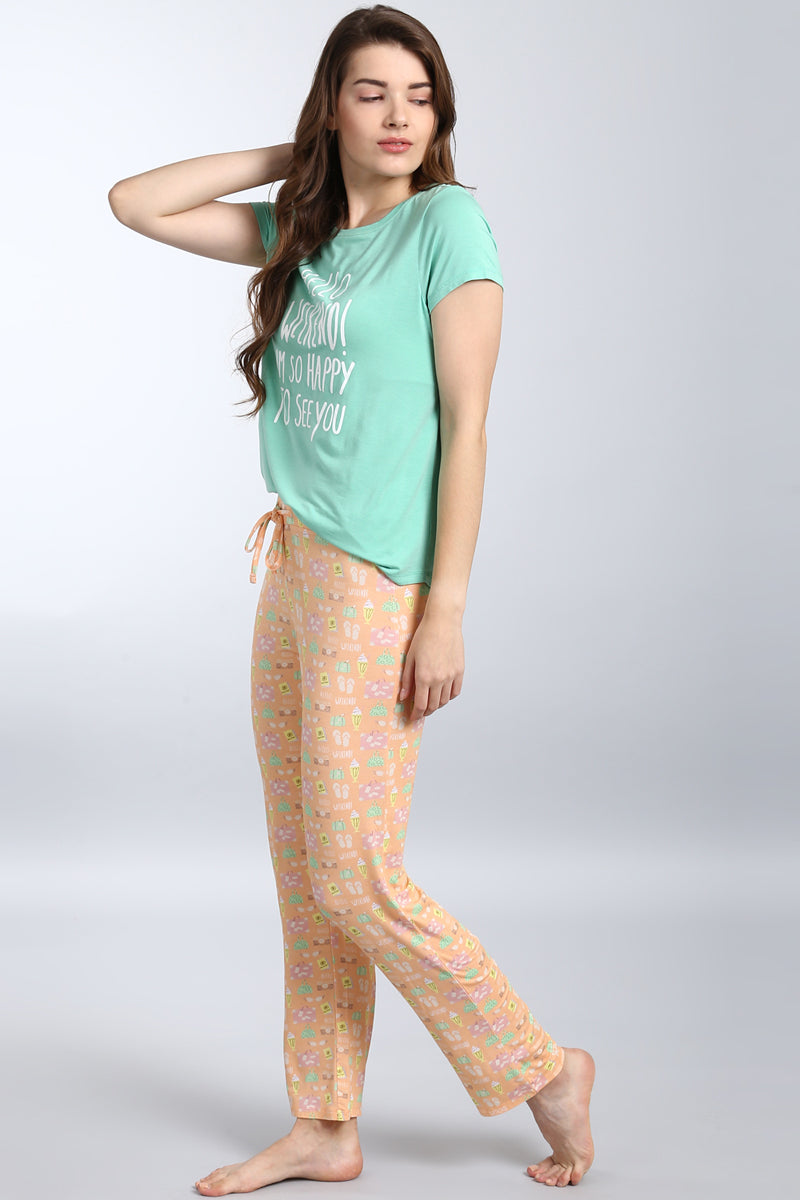 "Hello Weekend Pajama Set featuring a playful graphic tee and colorful pants."