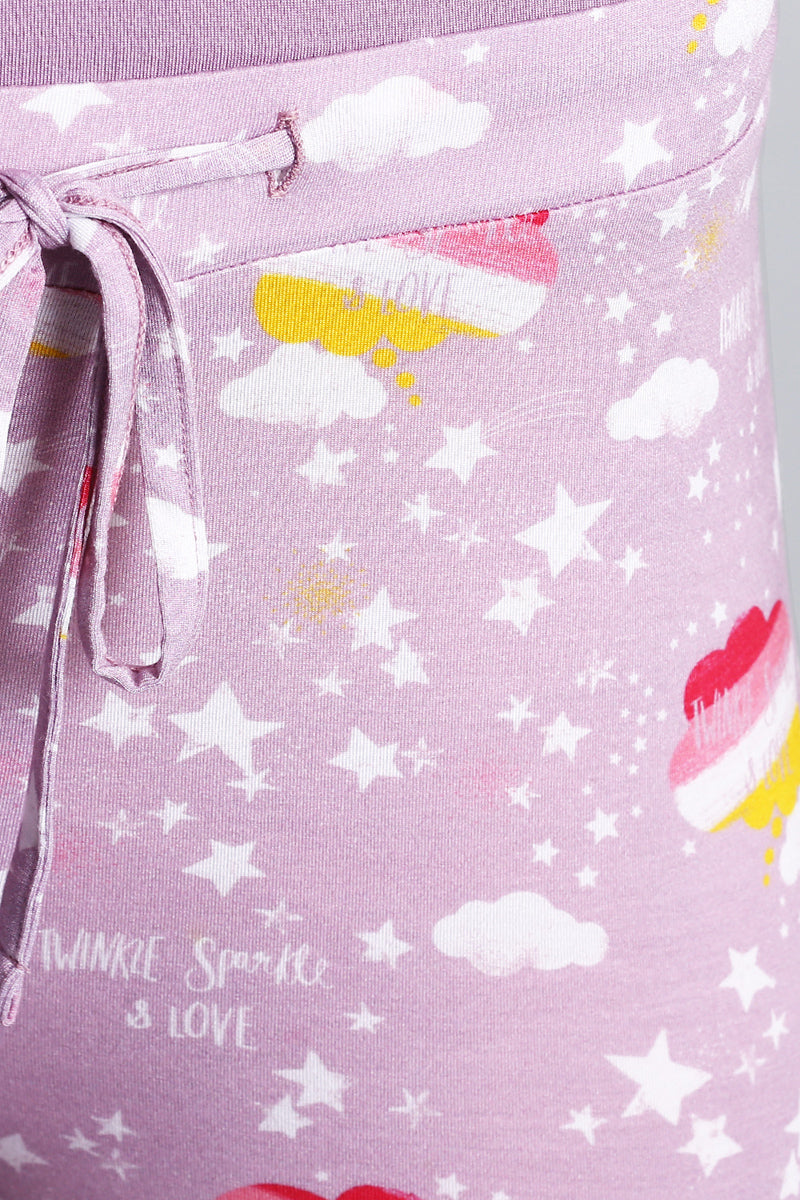 Day Dream Sparkle Pajama Set featuring playful star and cloud patterns.