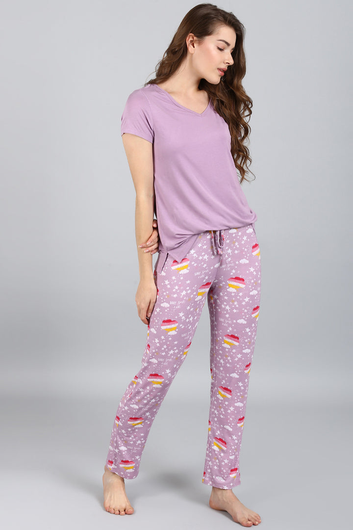 "Day Dream Sparkle Pajama Set in lavender with playful dessert print."