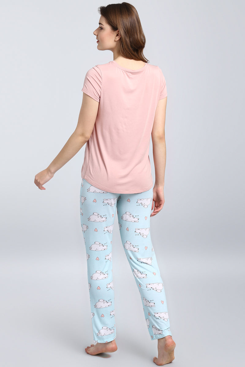 Puppy Love Top with cute pajama pants featuring playful dog prints.