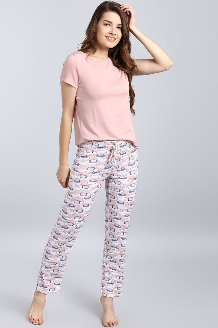 Sleepyhead Pajama Set featuring a pink top and patterned pants.