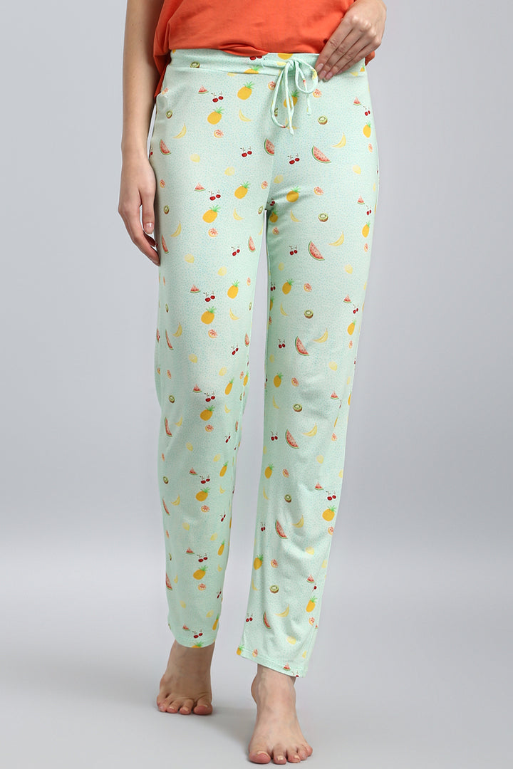 Berry Blast Pajama Set with colorful fruit patterns on mint fabric.