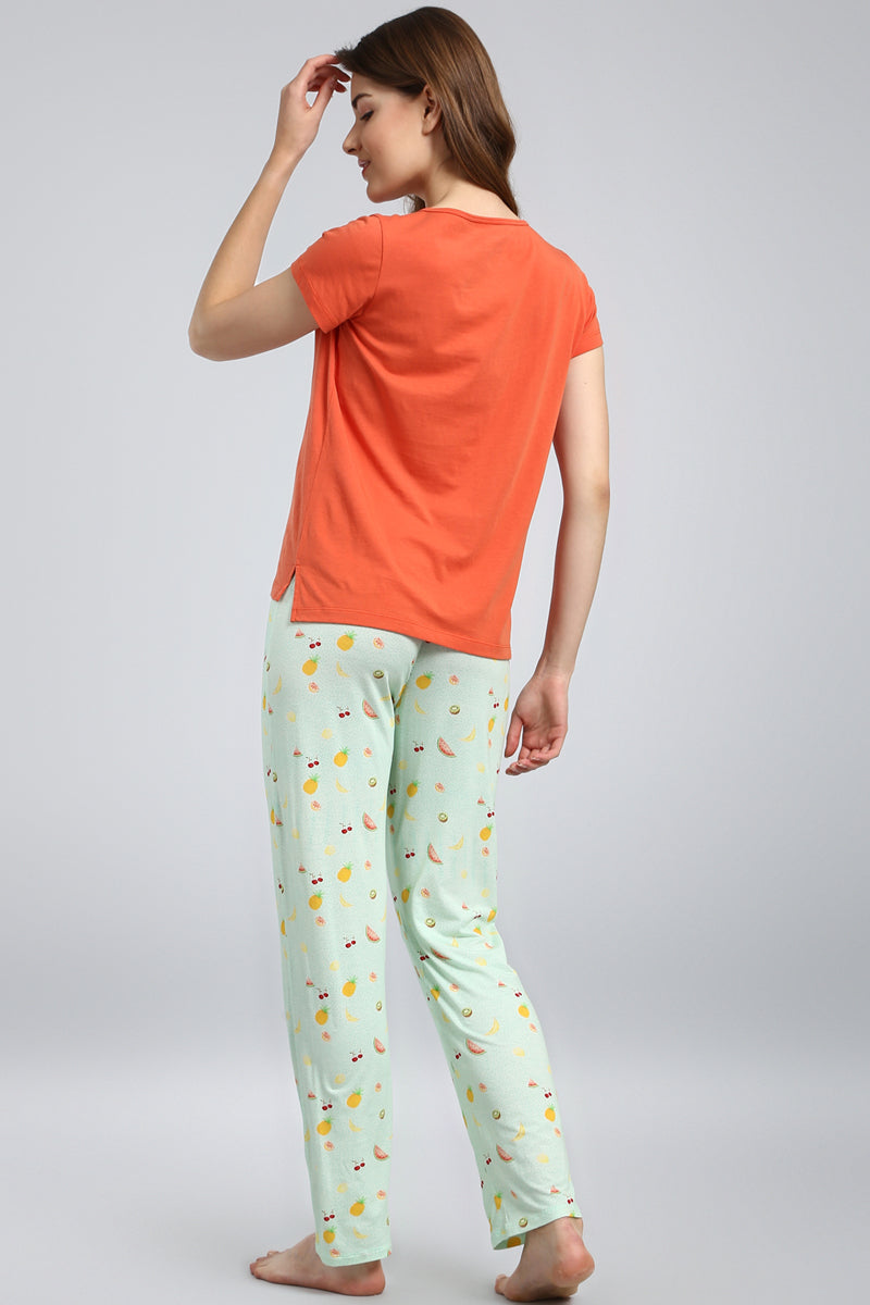 Women's Berry Blast Pajama Set in orange and mint green fruit print.