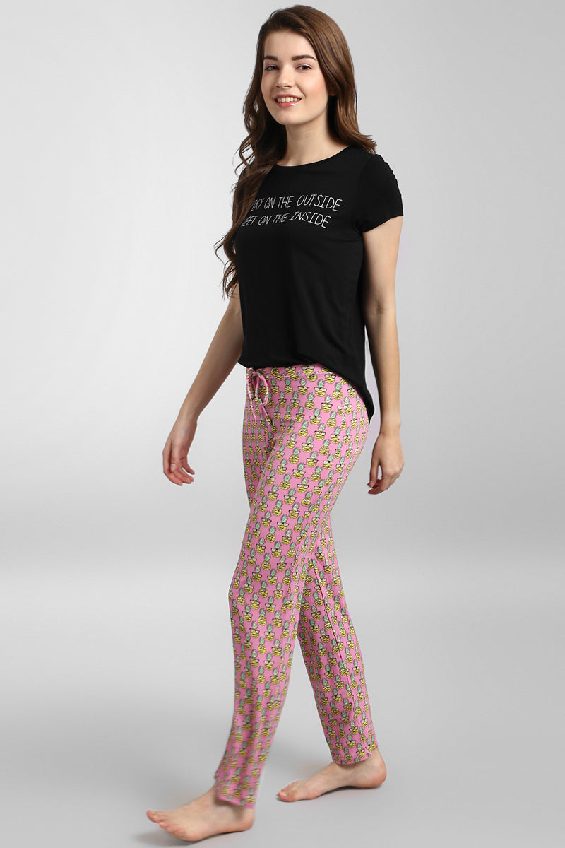 Tropical Vacay Pajama Set featuring comfy black top and playful printed pants.