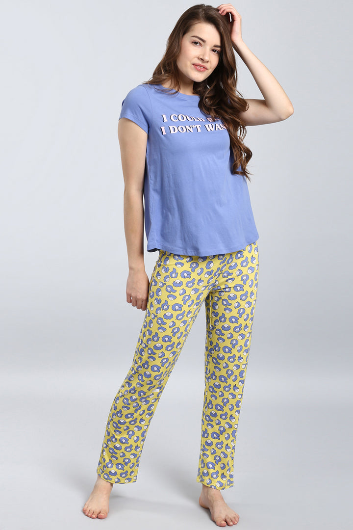 Happy Girl Pajama Set featuring a playful blue shirt and yellow patterned pants.