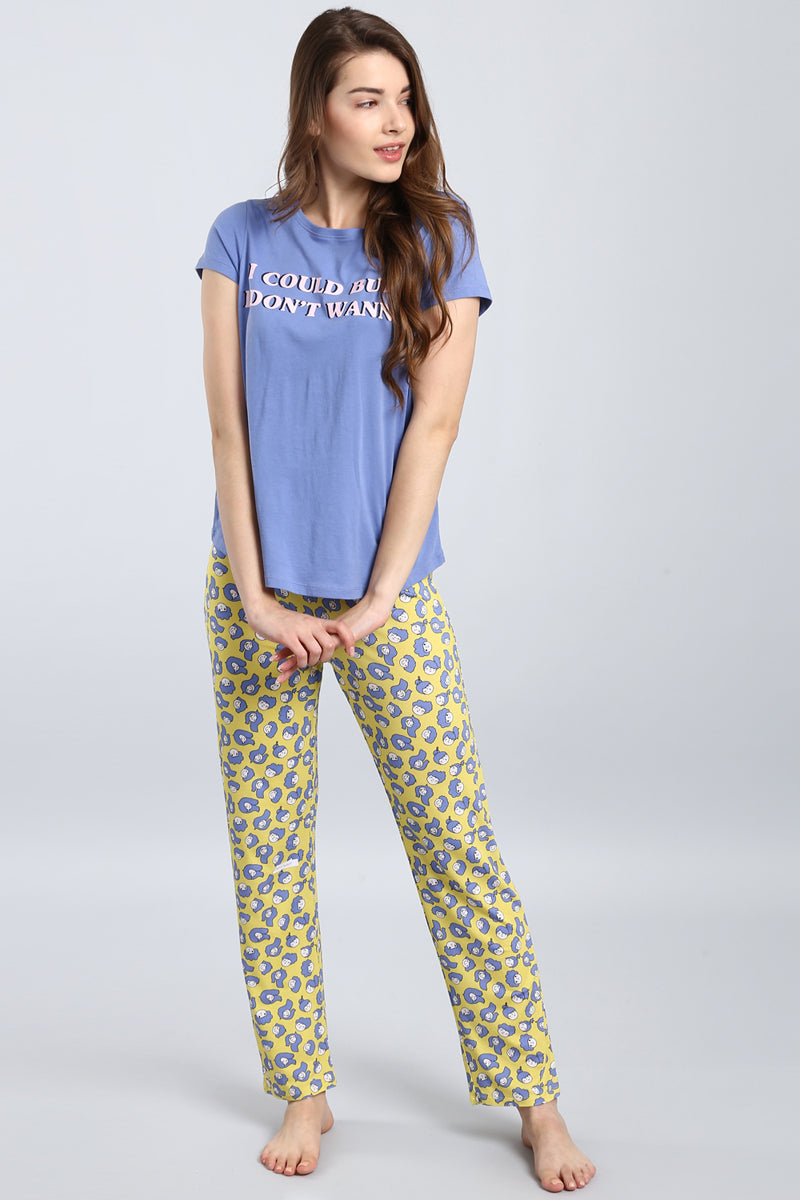 Happy Girl Pajama Set featuring playful blue and yellow patterns.