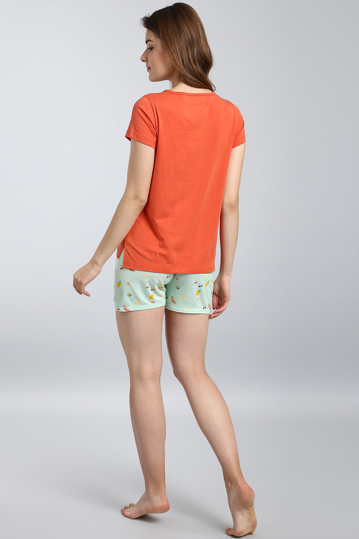 Berry Blast Shorts Set featuring an orange top and fruity print shorts.