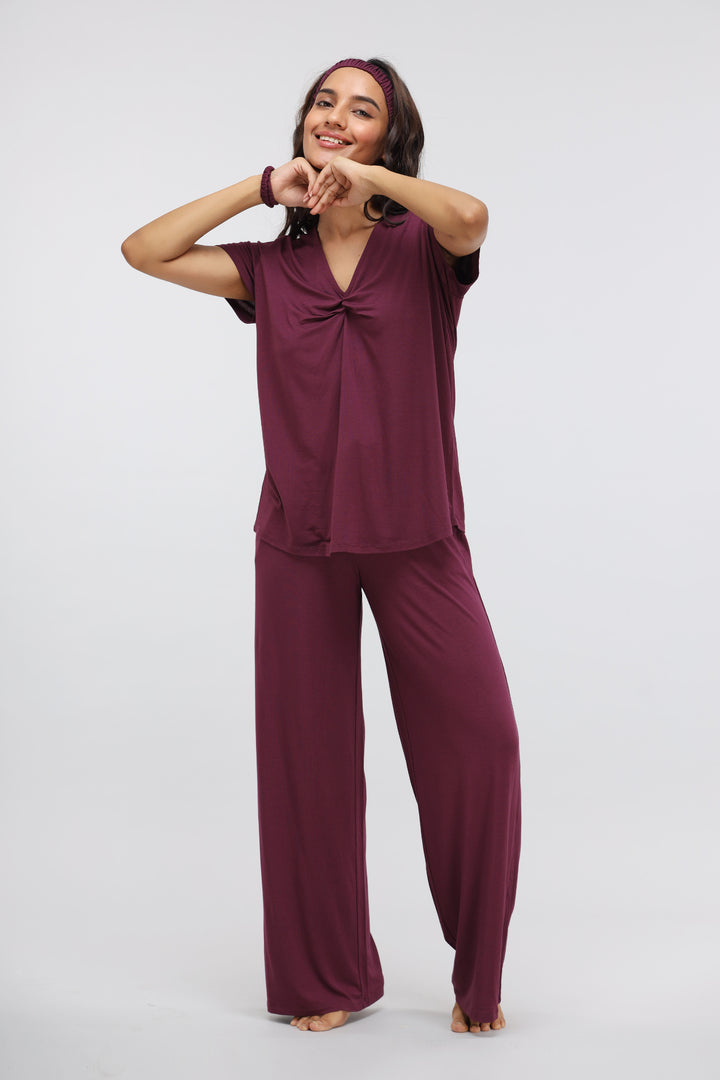 Wine colored modal lounge set with knot top, perfect for relaxing.