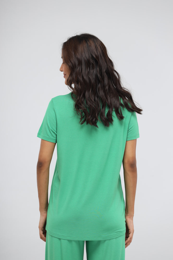 Green Bee Modal Lounge Set with Knot Top, back view, model wearing green.