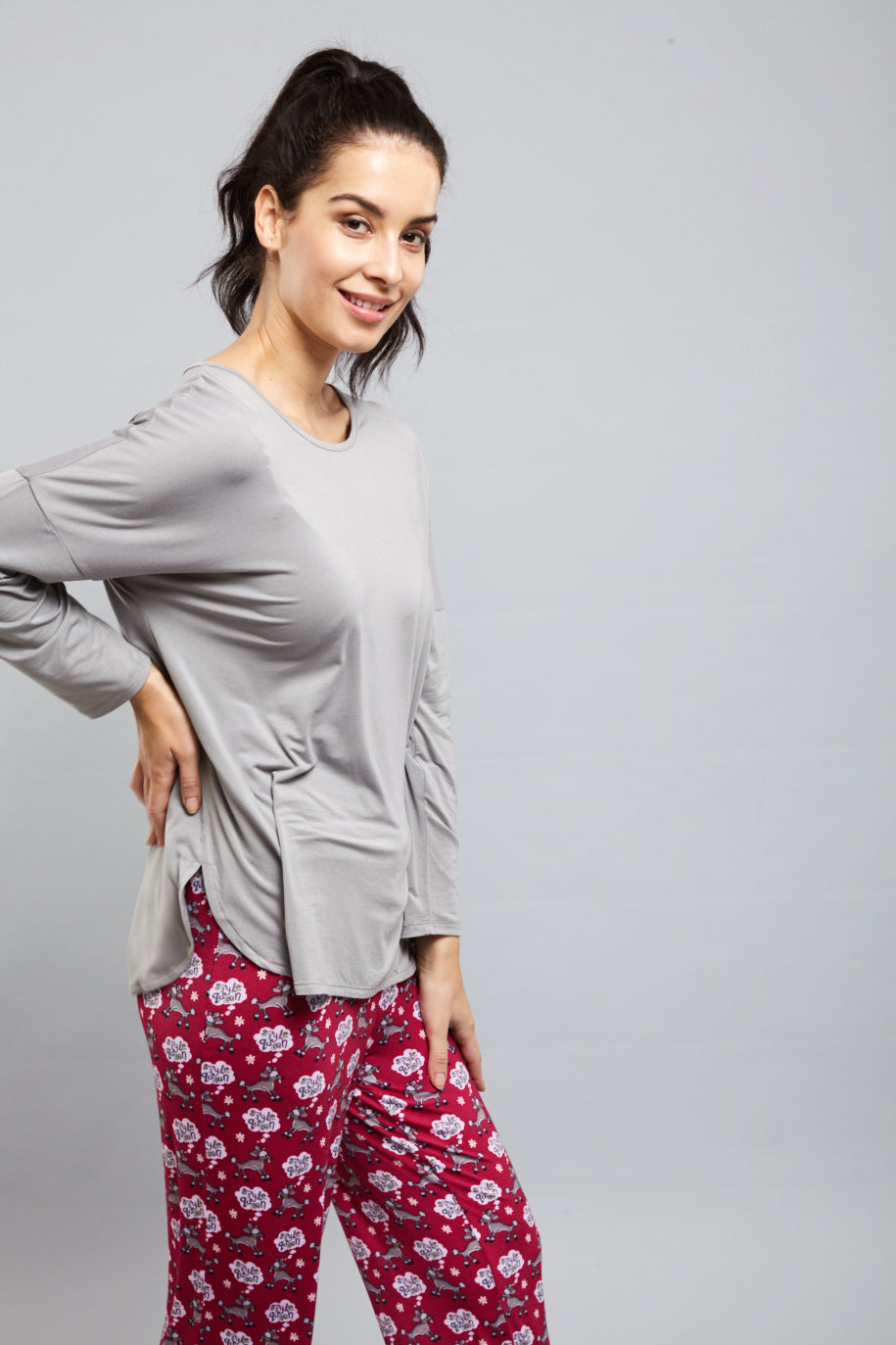 Model showcasing a stylish Dreamy Grey Top with comfortable pants.