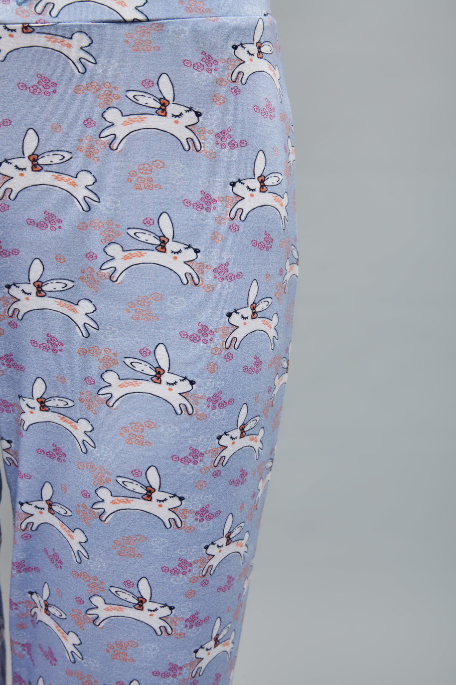 Loveable Rabbit Pajamas with playful bunny print on soft fabric.