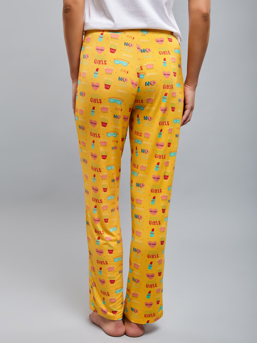 Yellow "Girl Power" pajamas featuring fun, colorful graphics and playful designs.